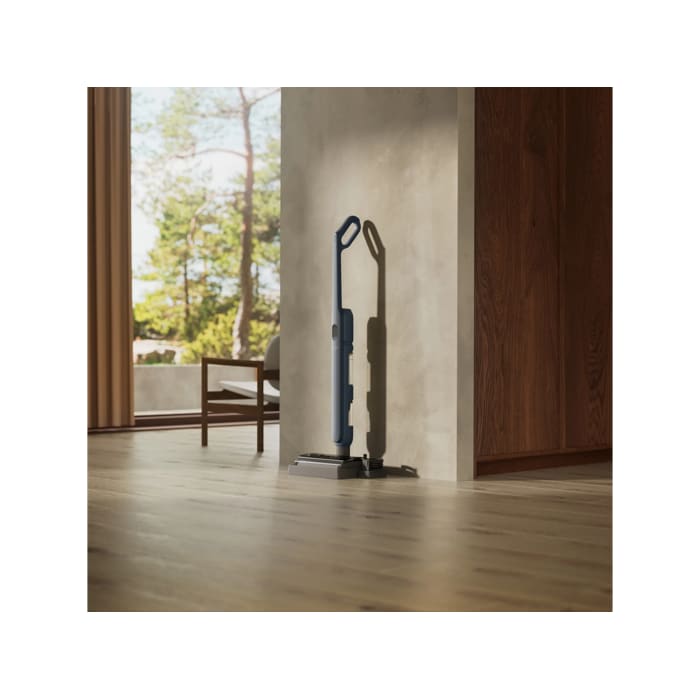 Vacuum cleaner in use in a home environment